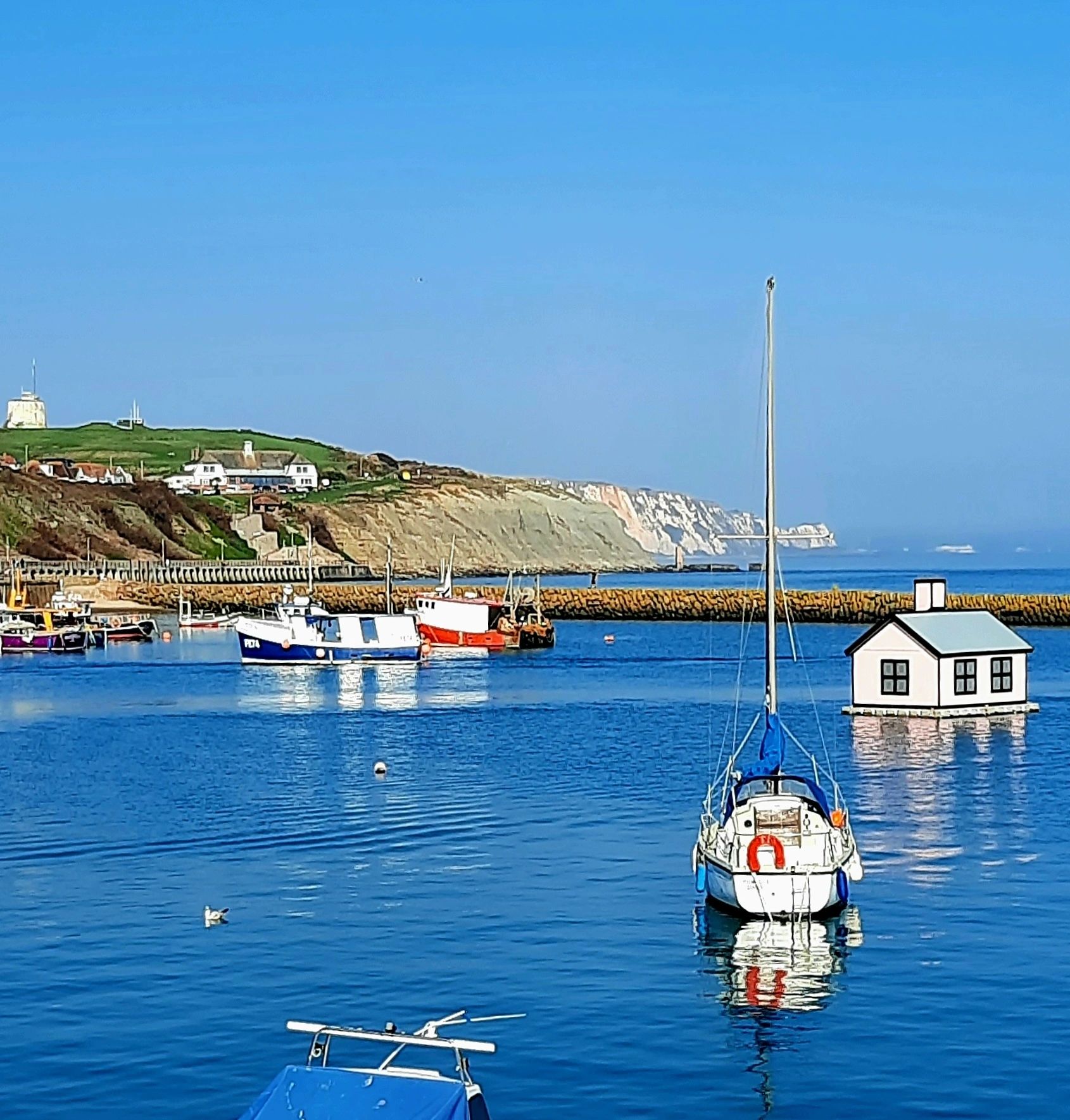 beach huts and harbour